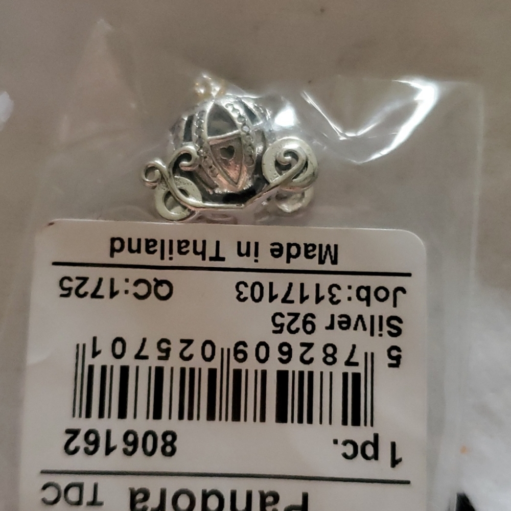 - Pandora 925 14 k charm Cinderella coach